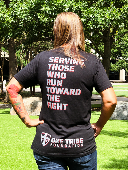 One Tribe Foundation black shield shirt. Serving those who run toward the fight.