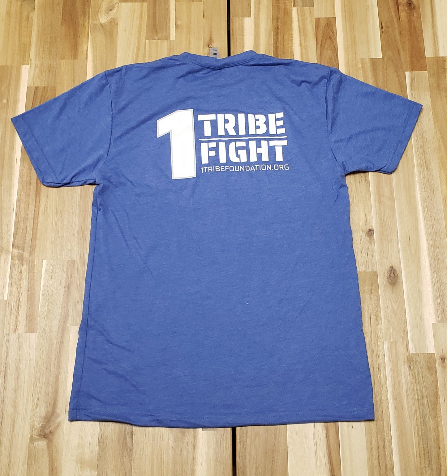 One Tribe Foundation royal blue t-shirt. One Tribe One Fight.