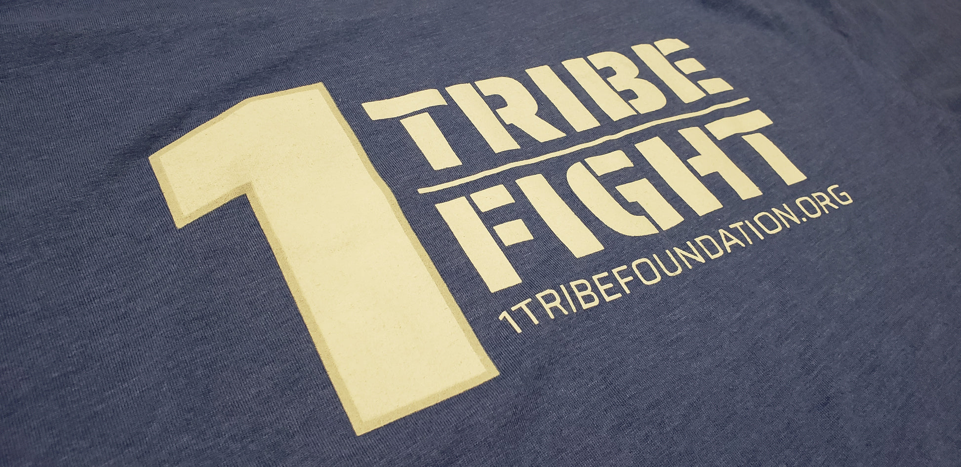 One Tribe Foundation royal blue t-shirt. One Tribe One Fight. 