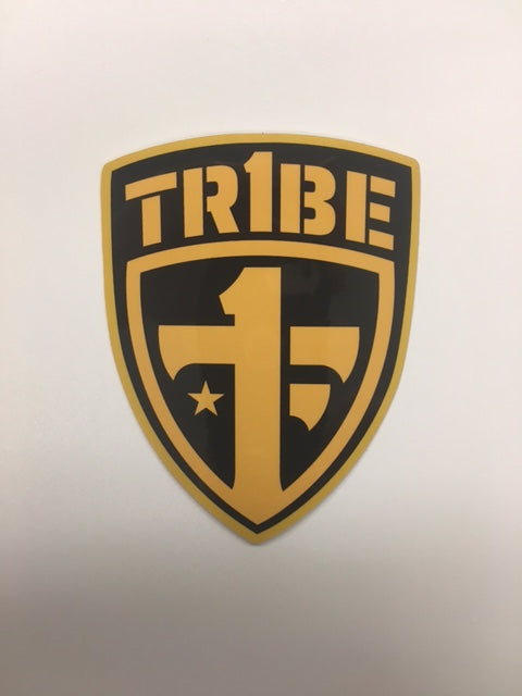 One Tribe Foundation "TR1BE" shield gold sticker.