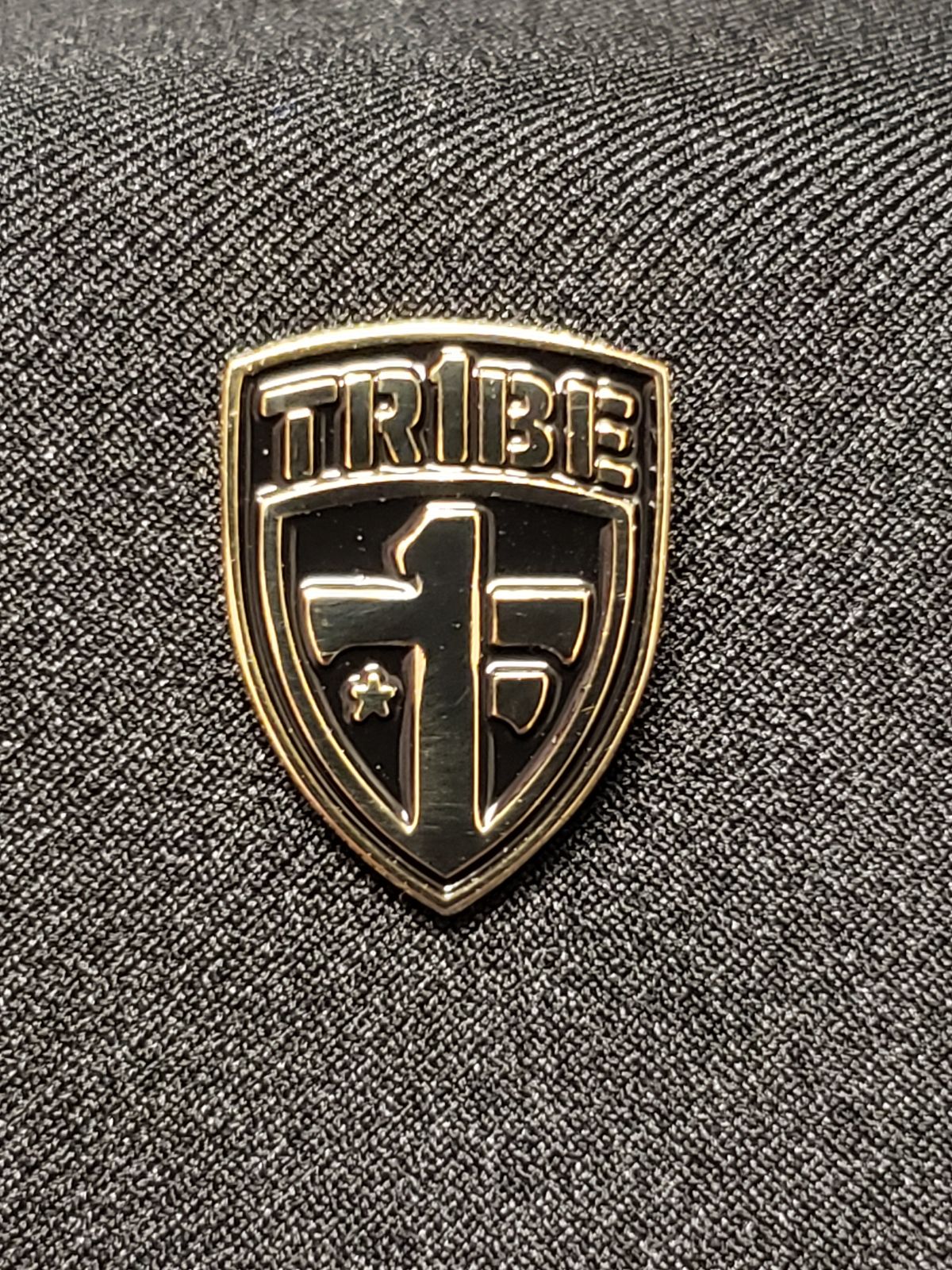One Tribe Foundation lapel pin
